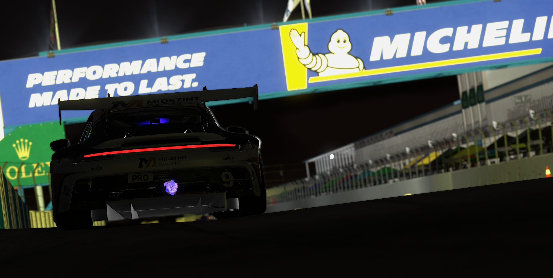 Midstint Racing Porsche 911 GT3 R running through the Sebring 12 Hour at night